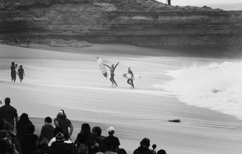 Joel Parkinson and Mick Fanning. Classic moment in a classic arena. Mick immediately became one leg of the chair carrying Joel up the beach, because that's what friends do. PHOTO: Sherman